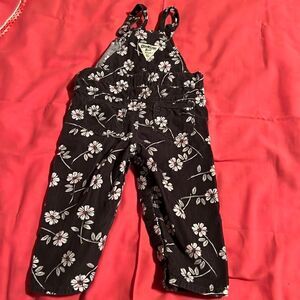 Osh Kosh girls black floral overalls. Size 12m